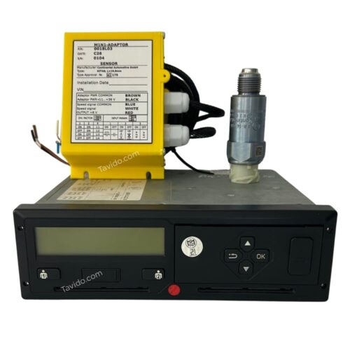 Automotive diagnostic device with a yellow adapter box mounted on a black control unit and a sensor attached to the side, used for vehicle testing on a bench or in a workshop.